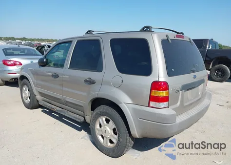 2001 Ford Escape Xlt z USA, uszkodzony, nr VIN 1FMYU03131KA15458